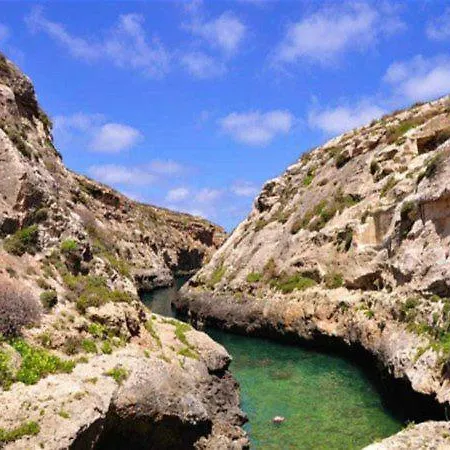Privat bolig Shared Cauchi Corner House With Roof Pool And Pay Per Use Aircondition Għarb
